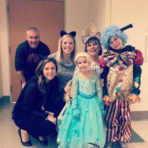 Kennedy family trick or treating around the hospital with friends