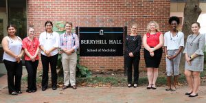 Kyle Melvin and Catherine Coe with students from the first UNC Family Medicine Summer Academy