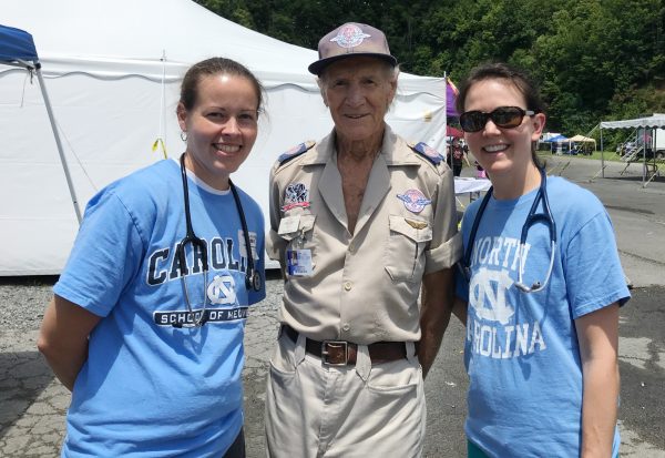 Second-year Physician Assistant Studies student Kendra Potter and Meg Beal, PA-C and PA program assistant professor, with Stan Brock. Brock is the founder of Remote Area Medical (RAM).