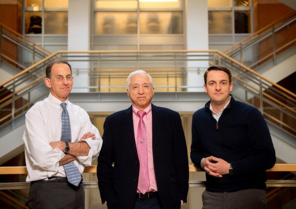 From left: David Margolis, MD, J. Victor Garcia, PhD, and Richard Dunham, PhD (credit: Jon Gardiner, UNC-Chapel Hill)