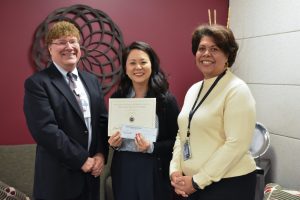 Julia Yi with Drs. Stephen Hooper and Brenda Mitchell.