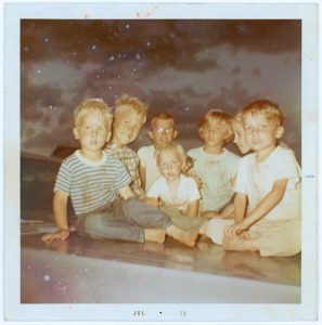 The Lemna kids, summer of 1970: (from left) Mike, Bill, Ron, Danny, Wanda, Joanne, and Curtis. Their older sister Nancy had already passed away because of cystic fibrosis. Youngest brother Jeff had not been born yet.