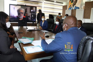 Zambian Health Minister video-conferencing Dr. Parham.